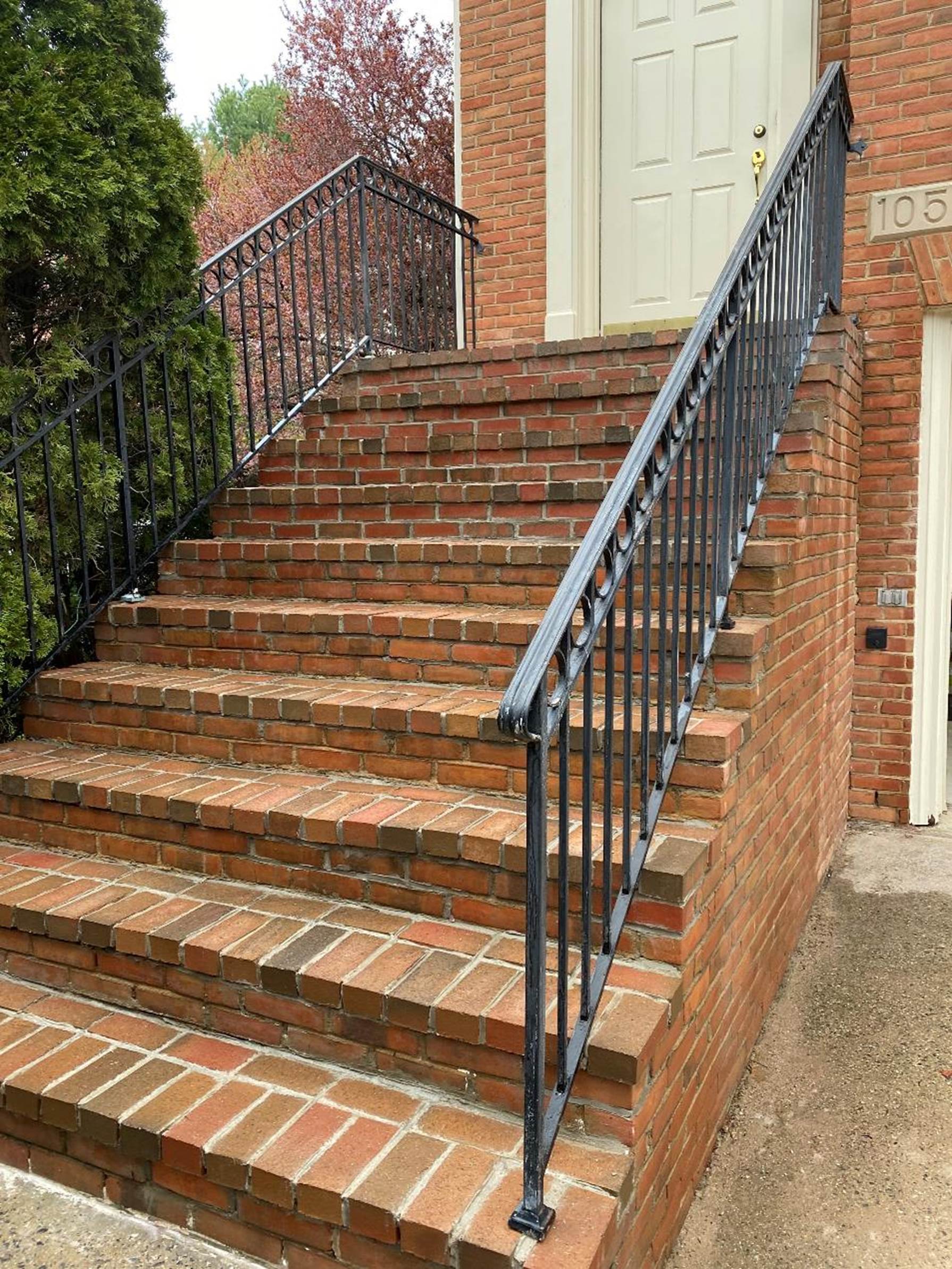 A set of stairs leading up to a door

Description automatically generated with medium confidence